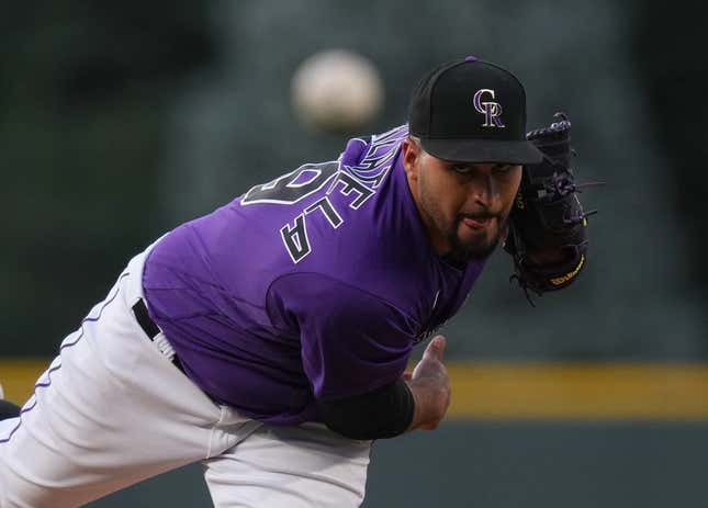 August 12, 2022;  Denver, Colorado, USA;  Colorado Rockies starting pitcher Antonio Senzatella (49) saves a pitch against the Arizona Diamondbacks in the first inning at Coors Field.