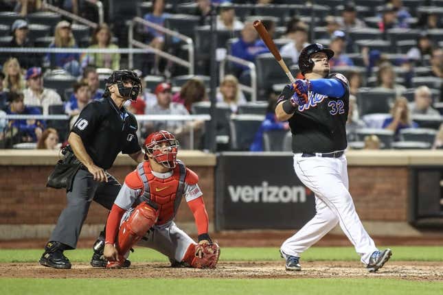 Jun 16, 2023; New York City, New York, USA; New York Mets designated hitter Daniel Vogelbach (32) hits a solo home run in the sixth inning against the St. Louis Cardinals at Citi Field.