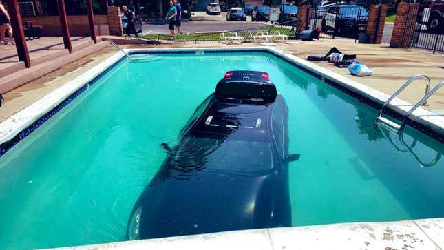An Infiniti G37xS gets a nice deep clean at the bottom of a pool.