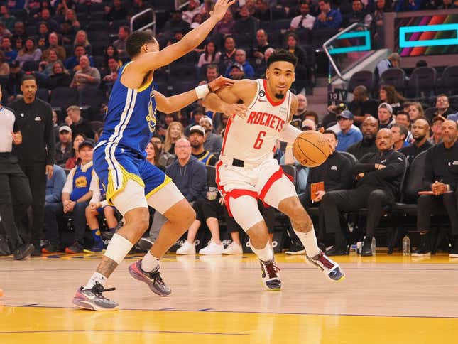 Feb 24, 2023; San Francisco, California, USA; Houston Rockets KJ Martin Jr. (6) is fouled by Golden State Warriors Jordan Poole (3) during the first quarter at Chase Center.