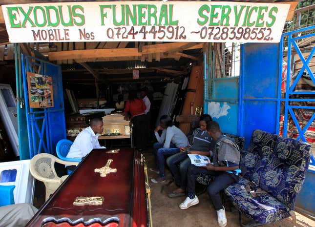 Often, they are even custom made. Bereaved relatives wait to pick newly built coffins from a roadside showroom in Nairobi.
