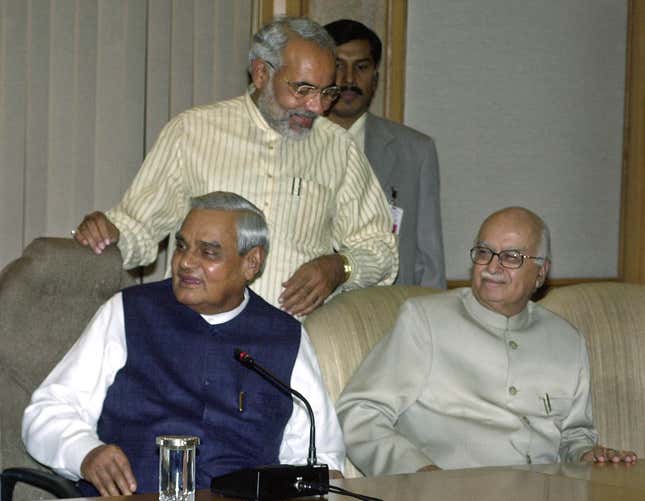 Advani with India’s former prime minister, Atal Bihari Vajpayee (seated left) and then Gujarat chief minister Narender Modi in 2002.
