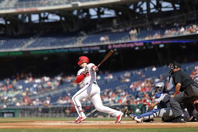 May 15, 2023; Washington, District of Columbia, USA; Washington Nationals designated hitter Joey Meneses (45) hits an RBI double against the New York Mets during the first inning at Nationals Park.