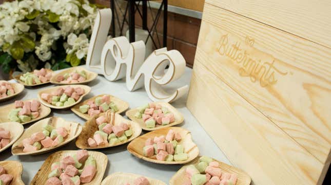 Buttermints in heart-shaped dishes on wedding spread
