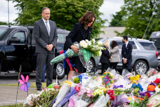 BUFFALO, NY - MAY 28: Vice President Kamala Harris and Second Gentleman Doug Emhoff pay their respects at a memorial at Tops Friendly Market, which was the site of a mass shooting, on Saturday, May 28, 2022 in Buffalo, NY.