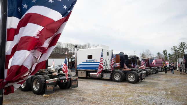 Demonstrators prepare to depart Hagerstown Speedway in Hagerstown, Maryland, on March 7, 2022, during “The People’s Convoy” event. - The convoy has called on US President Joe Biden to end vaccine and other Covid-19 pandemic mandates while modeling themselves after Canadian drivers who had occupied the center of Ottawa in a similar protest.