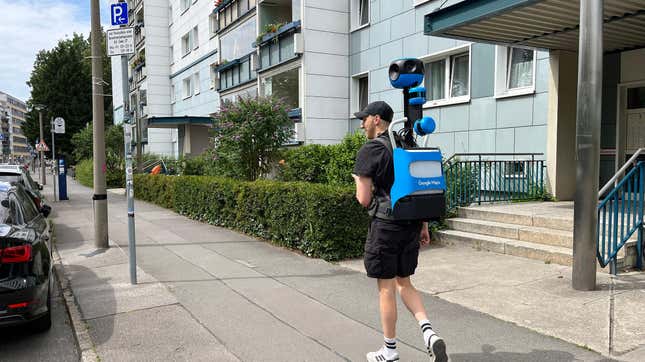  A man carrying a Google Street View Trekker backpack walks in the city center on July 03, 2023 in Berlin, Germany. The Street View Trekker, which is equipped with cameras pointing 360 degrees, is helping Google to show more hard to reach places for it Street View service in Google Maps. 