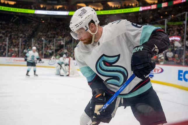 Mar 27, 2023; Saint Paul, Minnesota, USA; Seattle Kraken defenseman Adam Larsson (6) plays the puck in his end against the Minnesota Wild in the second period at Xcel Energy Center.