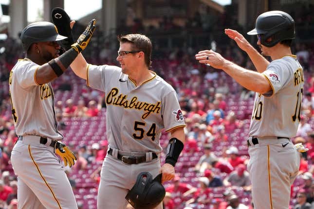 Pittsburgh Pirates designated hitter Rodolfo Castro (14) is congratulated by Pittsburgh Pirates catcher Tyler Heineman (54) and Pittsburgh Pirates center fielder Bryan Reynolds (10) after hitting a three-run home run in the third during of a baseball game, Wednesday, Sept. 14, 2022, at Great American Ball Park in Cincinnati.
Mlb Pittsburgh Pirates At Cincinnati Reds Sept 14 0818