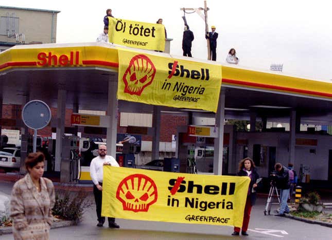 Greenpeace activists protesting at a Shell station in Zurich against the execution of nine minority rights activists including author Ken Saro-Wiwa in Nigeria.