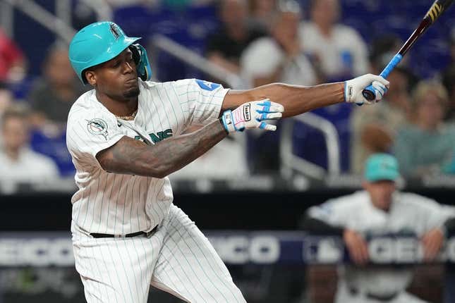 Aug 25, 2023; Miami, Florida, USA; Miami Marlins designated hitter Jorge Soler (12) strikes out in the fourth inning against the Washington Nationals at loanDepot Park.