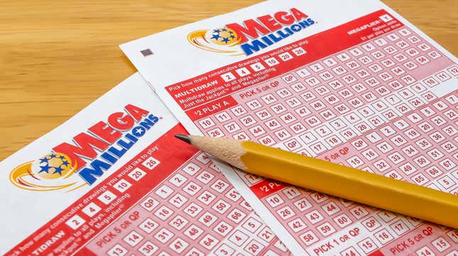 two blank mega millions lottery tickets with a sharpened pencil