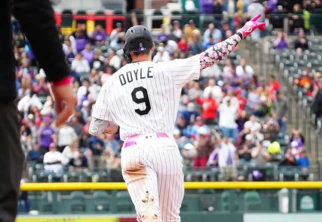 May 14, 2023; Denver, Colorado, USA; Colorado Rockies center fielder Brenton Doyle (9) runs off his solo home run in the fifth inning against the Philadelphia Phillies at Coors Field.