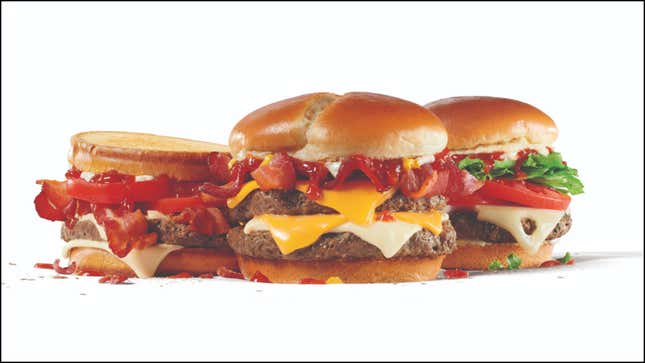 Product shot of three Jack in the Box plant-based Impossible Burgers