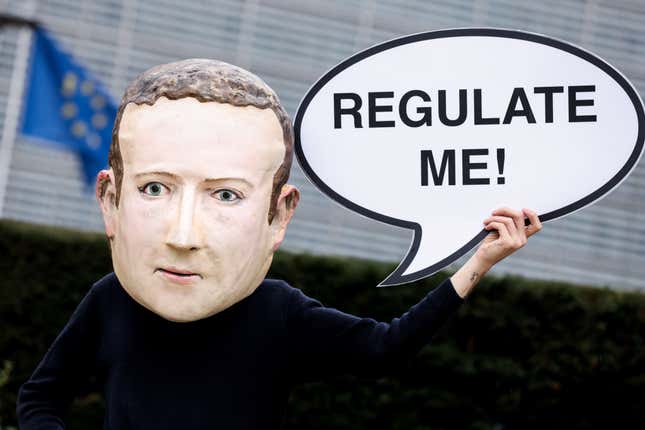 Person wearing Mark Zuckerberg mask in front of EU flag