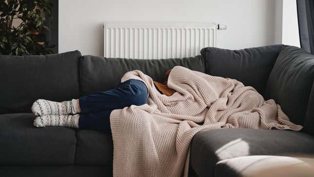 Image for article titled How to Sleep Comfortably on a Couch