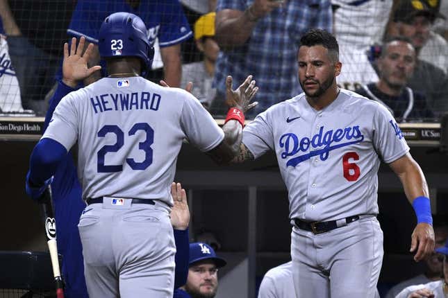Aug 4, 2023; San Diego, California, USA; Los Angeles Dodgers right fielder Jason Heyward (23) is congratulated by designated hitter David Peralta (6) after scoring a run against the San Diego Padres during the eighth inning at Petco Park.
