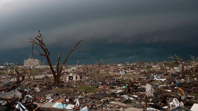 Destroyed homes and debris cover the ground on May 23, 2011 after a deadly tornado in Joplin, Missouri.