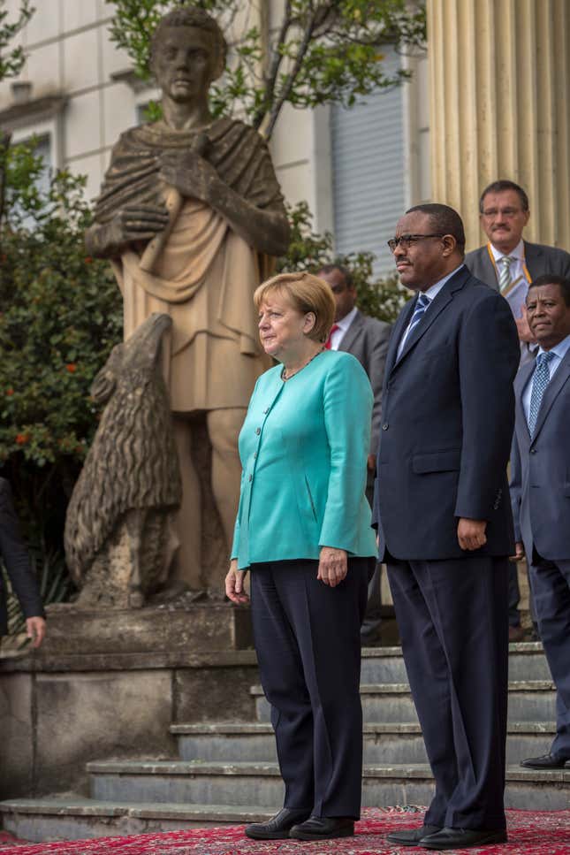 German Chancellor Angela Merkel, center, and Ethiopia's Prime Minister Hailemariam Desalegn.