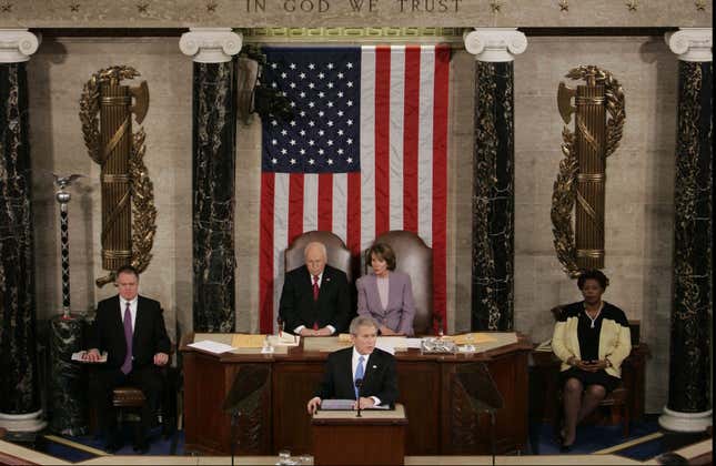 Fasci flanks the flag.