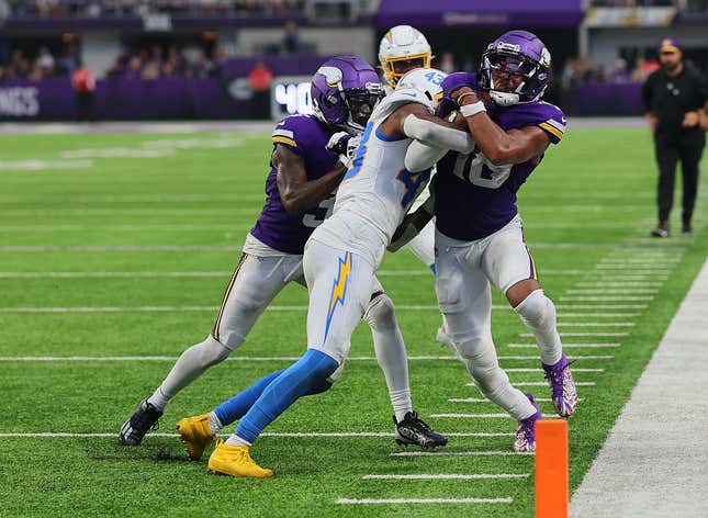 MINNEAPOLIS, MINNESOTA - SEPTEMBER 24: Michael Davis #43 of the Los Angeles Chargers pushes Justin Jefferson #18 of the Minnesota Vikings out of bounds during the fourth quarter at U.S. Bank Stadium on September 24, 2023 in Minneapolis, Minnesota. (Photo by Adam Bettcher/Getty Images)