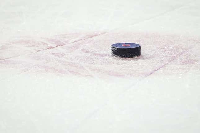 Jan 29, 2022; Calgary, Alberta, CAN; General view of the hockey puck during the third period between the Calgary Flames and the Vancouver Canucks at Scotiabank Saddledome.