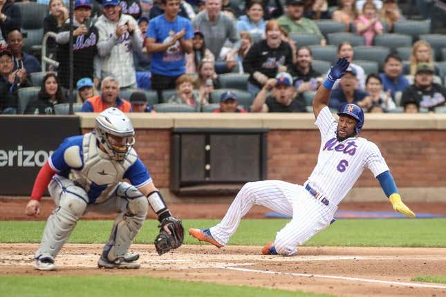 Jun 3, 2023; New York City, New York, USA; New York Mets right fielder Starling Marte (6) slides into home to score in the second inning against the Toronto Blue Jays at Citi Field.