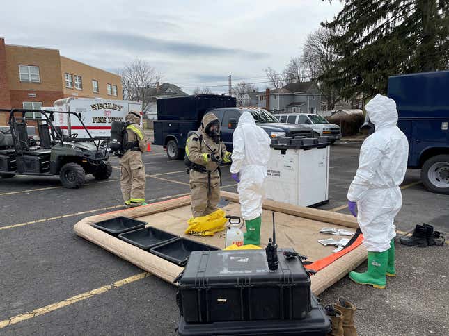 This photo provided by the Ohio National Guard, ONG 52nd Civil Support Team members prepare to enter an incident area to assess remaining hazards with a lightweight inflatable decontamination system (LIDS) in East Palestine, Ohio, Tuesday, Feb. 7, 2023.