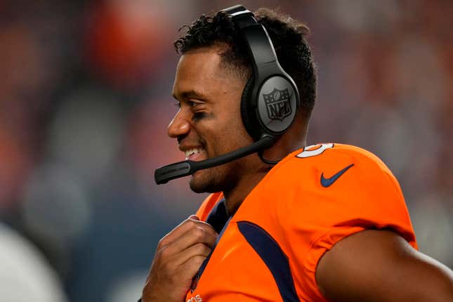 Denver Broncos quarterback Russell Wilson makes a call during the second half of an NFL preseason football game against the Minnesota Vikings, Saturday, Aug. 27, 2022, in Denver.
