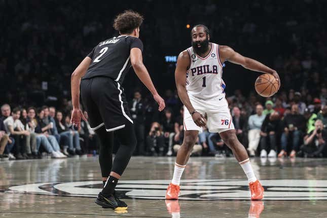 Apr 20, 2023; Brooklyn, New York, USA; Philadelphia 76ers guard James Harden (1) looks to drive past Brooklyn Nets forward Cameron Johnson (2) during game three of the 2023 NBA playoffs at Barclays Center.