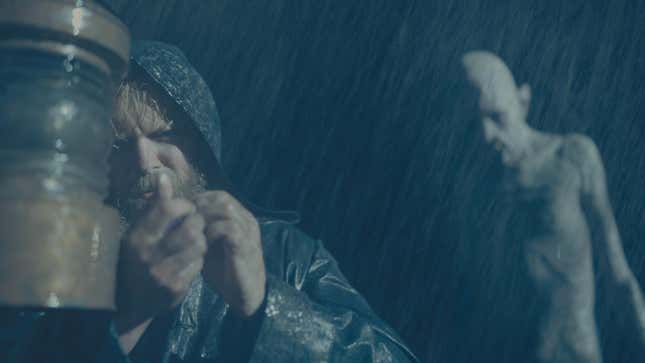 dracula behind a man in the rain