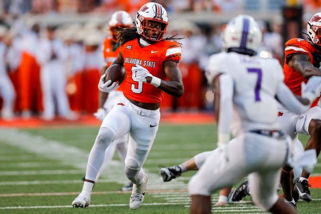Sep 2, 2023; Stillwater, Oklahoma, USA; Oklahoma State&#39;s Kendal Daniels (5) returns a recovered a fumble against Central Arkansas in the second quarter at Boone Pickens Stadium.