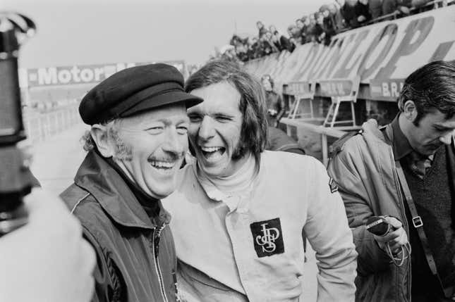 Colin Chapman (left) and Emerson Fittipaldi (right) at Silverstone in 1972.