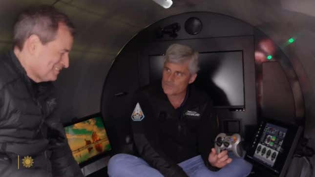 OceanGate's CEO holds up the Titan submarine's Logitech controller. 