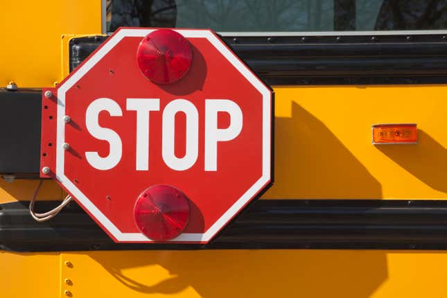 school bus with a stop sign