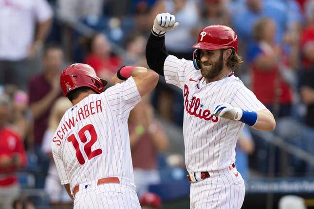 Aug 22, 2023; Philadelphia, Pennsylvania, USA; Philadelphia Phillies designated hitter Bryce Harper (3) celebrates with left fielder Kyle Schwarber (12) after hitting a two RBI home run during the first inning against the San Francisco Giants at Citizens Bank Park.