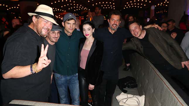 From left to right: Marc Benioff, Darren Aronofsky, Ashton Kutcher, St. Vincent, Guy Oseary and Elon Musk attend the Sound Ventures “The Party” at Hotel Van Zandt on March 10, 2018 in Austin, Texas.