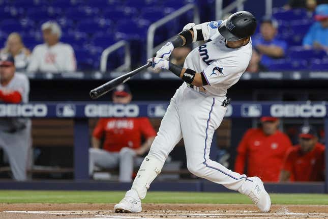 May 16, 2023; Miami, Florida, USA; Miami Marlins second baseman Luis Arraez (3) hits a double against the Washington Nationals during the first inning at loanDepot Park.