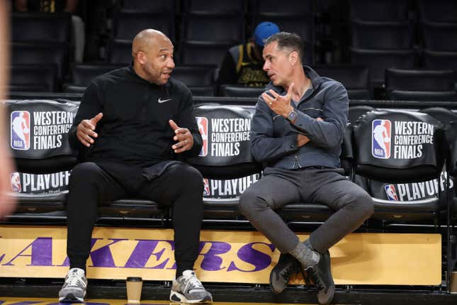 Darvin Ham and Rob Pelinka chat before Game 4