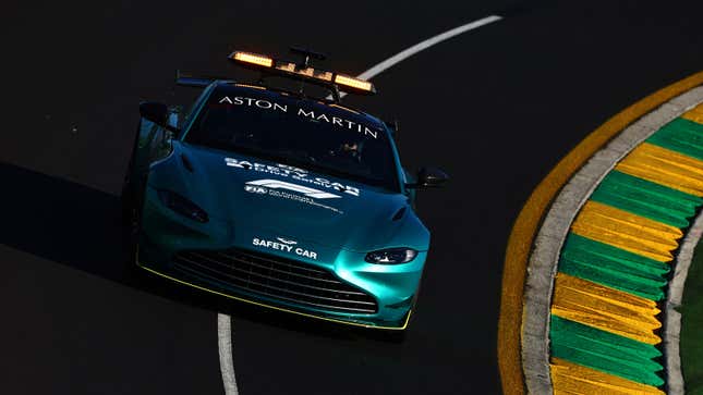 A green Aston Martin safety car on track in Australia.