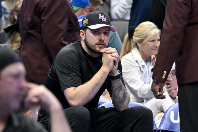 Apr 9, 2023; Dallas, Texas, USA; Dallas Mavericks guard Luka Doncic (77) sits by himself during a timeout in the game between the Dallas Mavericks and the San Antonio Spurs at the American Airlines Center.