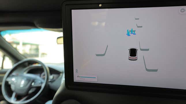A photo of a screen showing obstacle avoidance data in a car. 