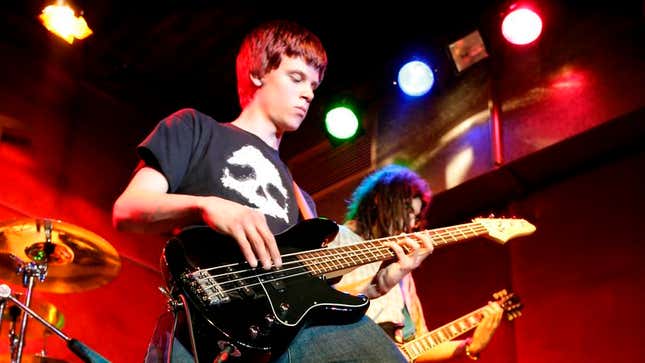 Image for article titled Bassist Has Little Riff Ready To Go In Case Frontman Goes Around Introducing Everyone