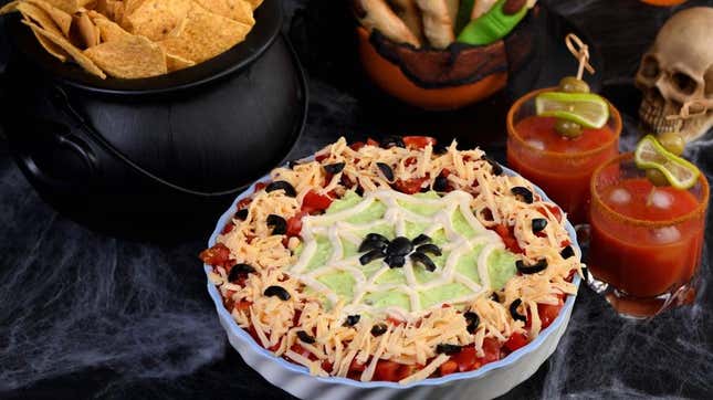 Spider Web Taco Dip and Spooky snack spread for Halloween