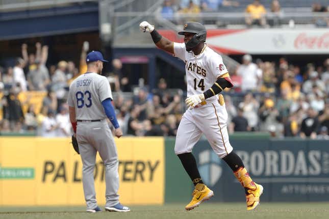 Apr 27, 2023; Pittsburgh, Pennsylvania, USA;  Pittsburgh Pirates shortstop Rodolfo Castro (14) reacts as he circles the bases on a solo home run against the Los Angeles Dodgers during the sixth inning at PNC Park.