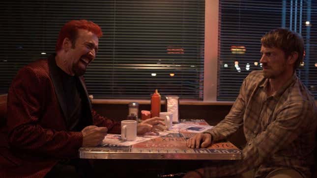 Nicolas Cage sits opposite Joel Kinnaman in a diner booth