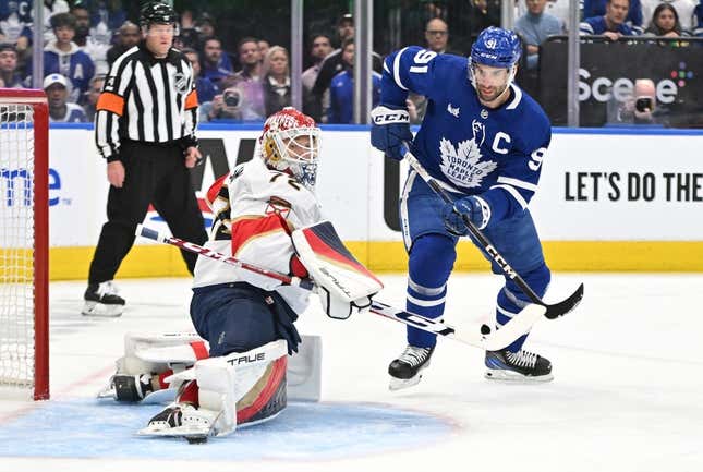 May 2, 2023; Toronto, Ontario, CANADA;  Florida Panthers goalie Sergei Bobrovsky (72) makes a save as Toronto Maple Leafs forward John Tavares (91) pursues the rebound in the first period in game one of the second round of the 2023 Stanley Cup Playoffs at Scotiabank Arena.