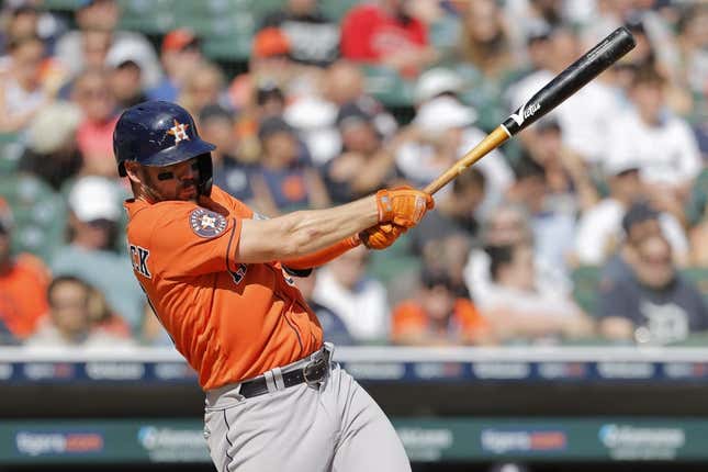 Aug 27, 2023; Detroit, Michigan, USA;  Houston Astros center fielder Chas McCormick (20) hits an RBI single in the eighth inning against the Detroit Tigers at Comerica Park.
