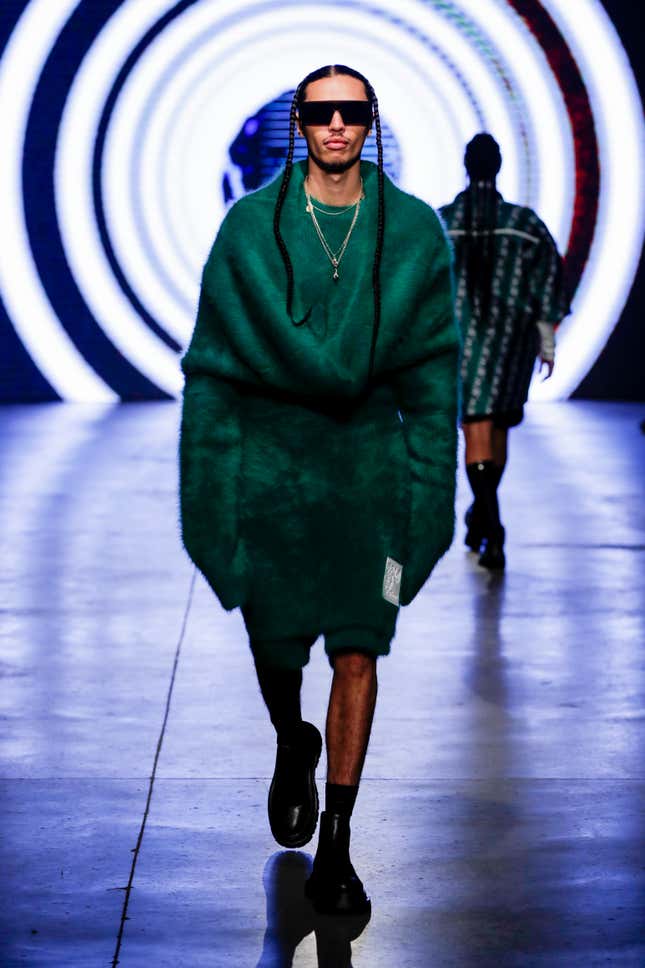 A model walks the runway at the KWK by KAY KWOK show during London Fashion Week February 2022 on February 22, 2022 in London, England.