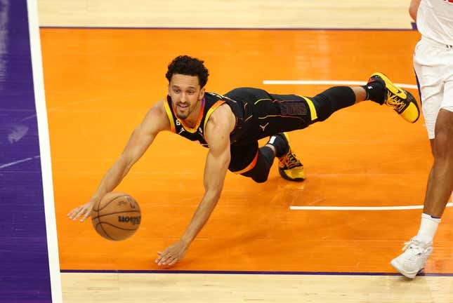 Apr 25, 2023; Phoenix, Arizona, USA; Phoenix Suns guard Landry Shamet dives for a loose ball against the Los Angeles Clippers during the second half in game five of the 2023 NBA playoffs at Footprint Center.